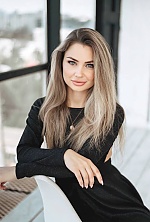 Ukrainian mail order bride Olga from Kharkiv with blonde hair and blue eye color - image 19