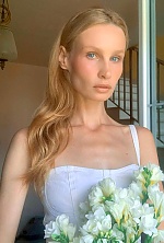 Ukrainian mail order bride Iryna from Khmelnytskyi with light brown hair and grey eye color - image 13