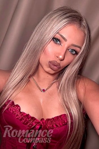 Ukrainian mail order bride Oriana from Buenos Aires with blonde hair and blue eye color - image 1