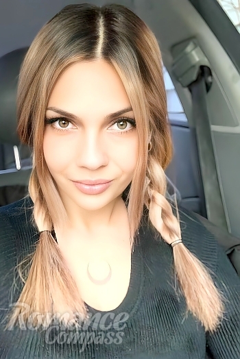 Ukrainian mail order bride Bohdana from Luxembourg with light brown hair and hazel eye color - image 1