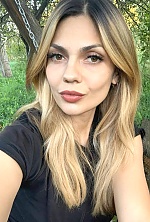 Ukrainian mail order bride Bohdana from Luxembourg with light brown hair and hazel eye color - image 24