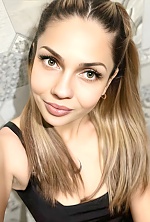 Ukrainian mail order bride Bohdana from Luxembourg with light brown hair and hazel eye color - image 78