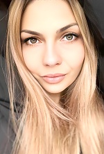 Ukrainian mail order bride Bohdana from Luxembourg with light brown hair and hazel eye color - image 79
