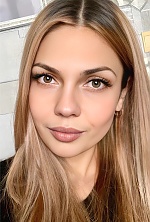 Ukrainian mail order bride Bohdana from Luxembourg with light brown hair and hazel eye color - image 76