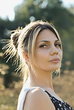 Ukrainian mail order bride Bohdana from Luxembourg with light brown hair and hazel eye color - image 29