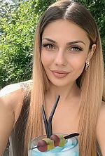 Ukrainian mail order bride Bohdana from Luxembourg with light brown hair and hazel eye color - image 36