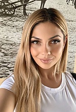 Ukrainian mail order bride Bohdana from Luxembourg with light brown hair and hazel eye color - image 36