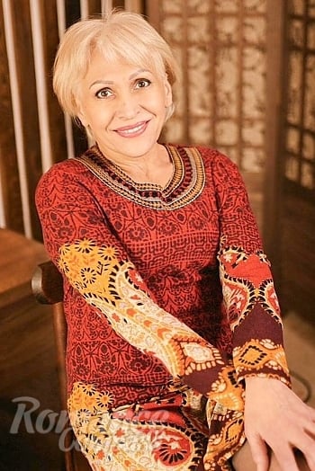 Ukrainian mail order bride Iryna from Dnipro with blonde hair and blue eye color - image 1