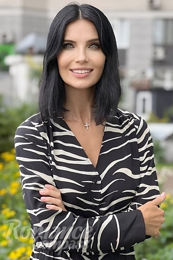 Ukrainian mail order bride Marina from Kyiv with black hair and green eye color - image 1