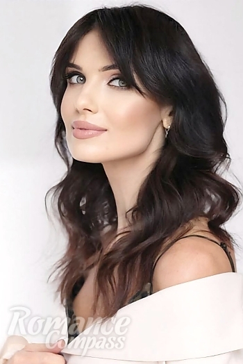 Ukrainian mail order bride Marina from Kyiv with black hair and green eye color - image 1