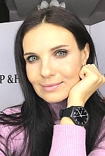 Ukrainian mail order bride Marina from Kyiv with black hair and green eye color - image 10