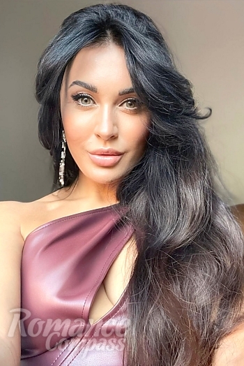 Ukrainian mail order bride Iryna from Kyiv with black hair and green eye color - image 1