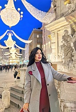 Ukrainian mail order bride Iryna from Kyiv with black hair and green eye color - image 10