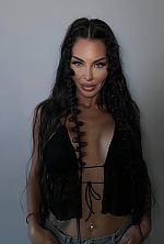 Ukrainian mail order bride Oksana from Berlin with black hair and brown eye color - image 11