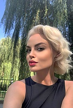 Ukrainian mail order bride Vika from Kyiv with blonde hair and green eye color - image 11