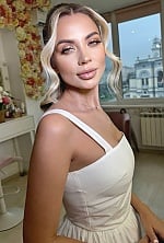 Ukrainian mail order bride Bohdana from Kyiv with blonde hair and green eye color - image 13