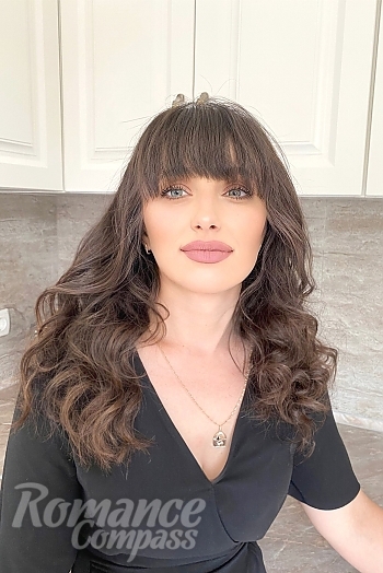 Ukrainian mail order bride Oksana from Kyiv with brunette hair and brown eye color - image 1