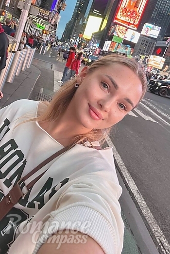 Ukrainian mail order bride Alina from New York with blonde hair and blue eye color - image 1