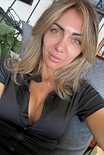 Ukrainian mail order bride Tatiyana from München with light brown hair and green eye color - image 19