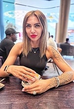 Ukrainian mail order bride Tatiyana from München with light brown hair and green eye color - image 17
