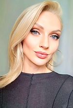 Ukrainian mail order bride Anna from Kyiv with blonde hair and green eye color - image 4