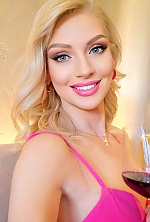 Ukrainian mail order bride Anna from Kyiv with blonde hair and green eye color - image 8