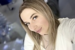 Ukrainian mail order bride Olena from Warsaw with blonde hair and grey eye color - image 24