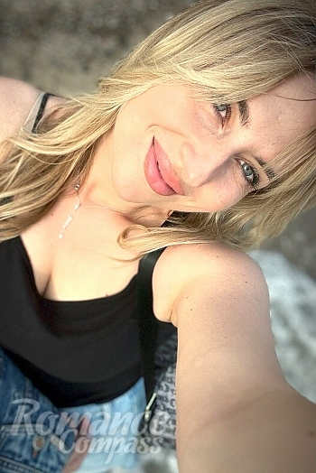 Ukrainian mail order bride Olena from Warsaw with blonde hair and grey eye color - image 1