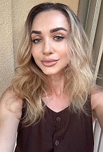 Ukrainian mail order bride Olesya from Dubai with light brown hair and grey eye color - image 9