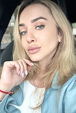 Ukrainian mail order bride Olesya from Dubai with light brown hair and grey eye color - image 8