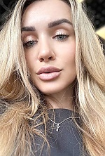 Ukrainian mail order bride Olesya from Dubai with light brown hair and grey eye color - image 14