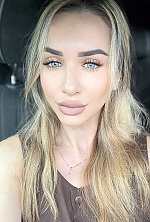 Ukrainian mail order bride Olesya from Dubai with light brown hair and grey eye color - image 2