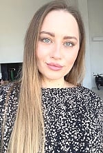 Ukrainian mail order bride Anastasiia from Prague with blonde hair and blue eye color - image 44