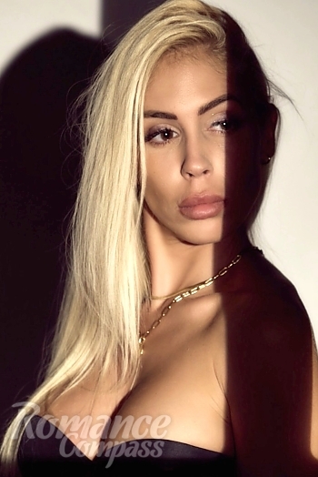 Ukrainian mail order bride Marta from Seville with blonde hair and brown eye color - image 1