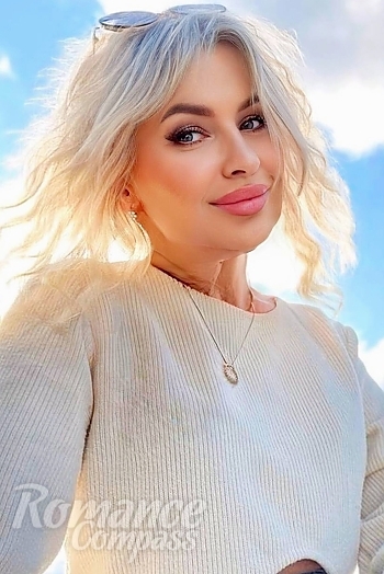 Ukrainian mail order bride Halyna from Dnipro with blonde hair and blue eye color - image 1