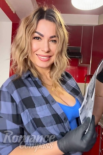 Ukrainian mail order bride Ekaterina from Kiyiv with light brown hair and brown eye color - image 1