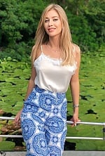 Ukrainian mail order bride Dariia from Kyiv with blonde hair and blue eye color - image 8