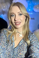 Ukrainian mail order bride Dariia from Kyiv with blonde hair and blue eye color - image 11