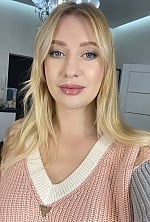 Ukrainian mail order bride Dariia from Kyiv with blonde hair and blue eye color - image 14
