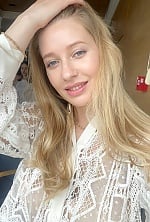 Ukrainian mail order bride Dariia from Kyiv with blonde hair and blue eye color - image 5