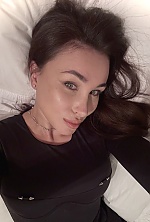 Ukrainian mail order bride Ekaterina from Luxembourg with black hair and green eye color - image 45