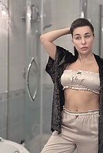 Ukrainian mail order bride Ekaterina from Luxembourg with black hair and green eye color - image 2