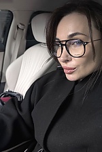 Ukrainian mail order bride Ekaterina from Luxembourg with black hair and green eye color - image 3