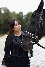 Ukrainian mail order bride Ekaterina from Luxembourg with black hair and green eye color - image 37