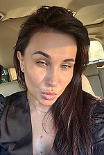 Ukrainian mail order bride Ekaterina from Luxembourg with black hair and green eye color - image 9