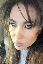 Ukrainian mail order bride Ekaterina from Luxembourg with black hair and green eye color - image 19