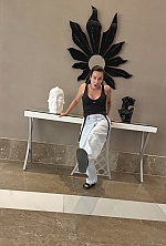 Ukrainian mail order bride Ekaterina from Luxembourg with black hair and green eye color - image 8