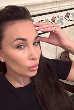 Ukrainian mail order bride Ekaterina from Luxembourg with black hair and green eye color - image 27