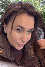 Ukrainian mail order bride Ekaterina from Luxembourg with black hair and green eye color - image 20