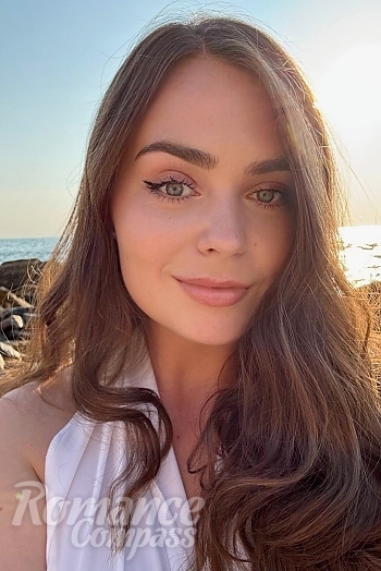 Ukrainian mail order bride Valeria from Kyiv with light brown hair and green eye color - image 1